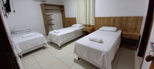 Ένα ή περισσότερα κρεβάτια σε δωμάτιο στο Pousada Parada Obrigatória Catimbau inn