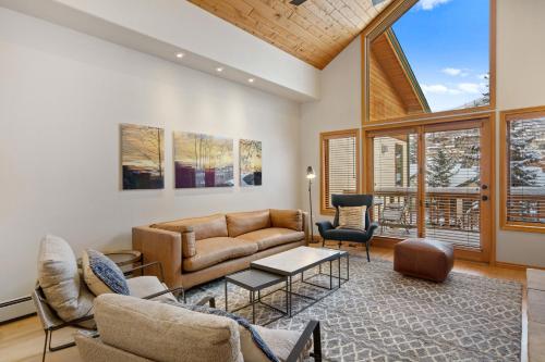 a living room with a couch and chairs at Evergreens 12 in Steamboat Springs