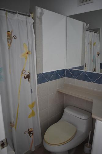 Ванна кімната в Exclusivo departamento frente al mar en Same, Casa Blanca