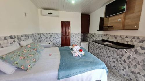 Postel nebo postele na pokoji v ubytování Hotel Marajó - Turismo de Experiência
