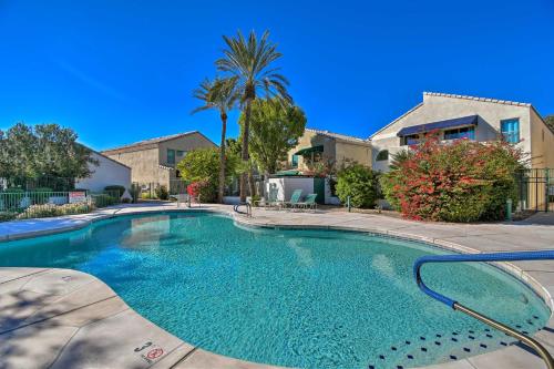 a swimming pool in front of a house at 6 Mi to Downtown Condo with Patio in Tempe! in Tempe