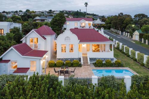an aerial view of a house with a pool at Westhill Luxury Guest House in Knysna