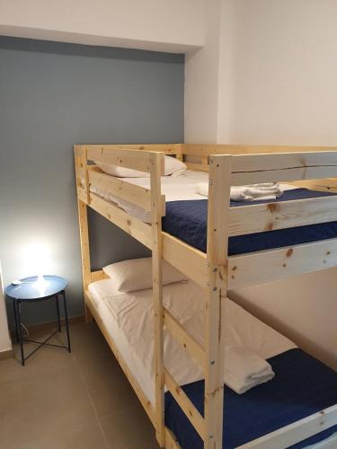 Postel nebo postele na pokoji v ubytování Tefkrou Anthia 9 apts