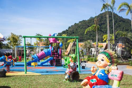 a playground with a bunch of different types of play equipment at Vakara Hotel Kep in Kep
