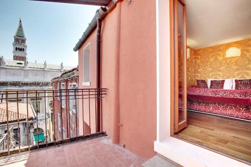 a balcony with a view of a building at Hotel Casanova in Venice