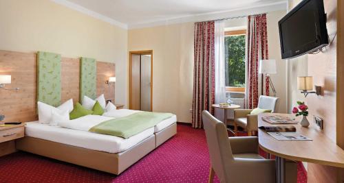 Postel nebo postele na pokoji v ubytování Hotel Liebl