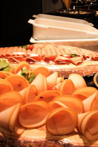 a group of plates of food on a table at Seas Hotel Amman in Amman