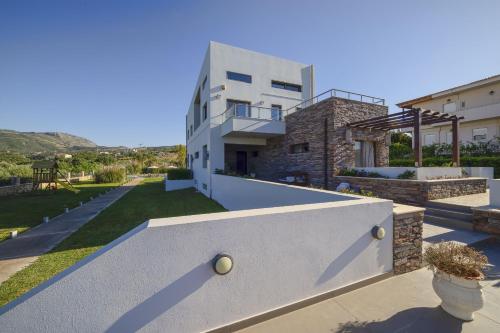 a villa with a view of a house at Villa Sfedami in Mikro Metochi