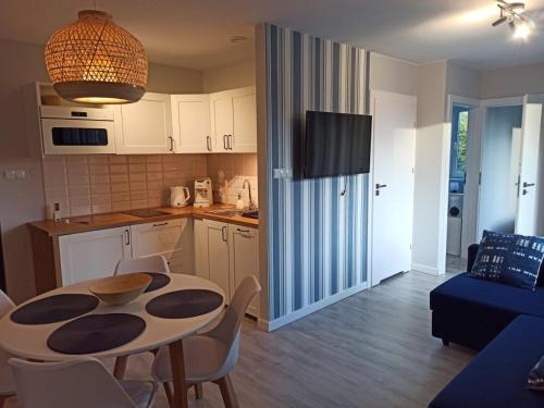 Η κουζίνα ή μικρή κουζίνα στο Apartamenty Prima