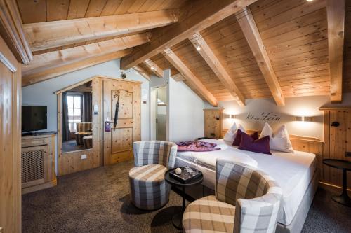 Postel nebo postele na pokoji v ubytování Hotel Viertler