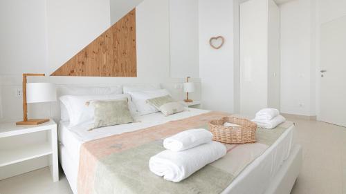 Ένα ή περισσότερα κρεβάτια σε δωμάτιο στο Rivazzurra Homes - C