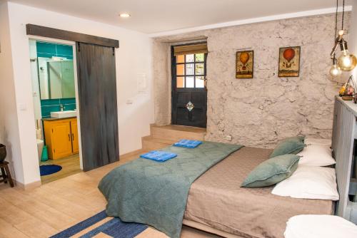 Postel nebo postele na pokoji v ubytování Quinta da Quinta