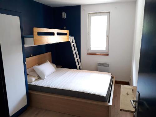 Postel nebo postele na pokoji v ubytování Appartement 4-5 personnes au pied des pistes de Val Louron