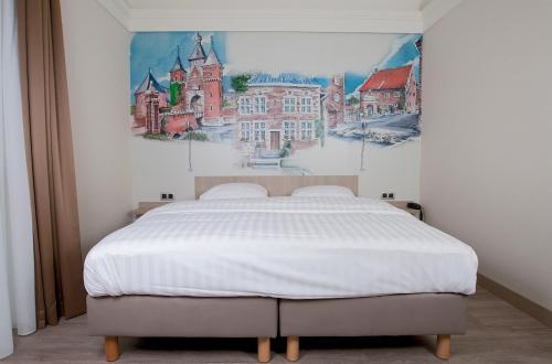 Un pat sau paturi într-o cameră la Blanckthys Hotel Voeren