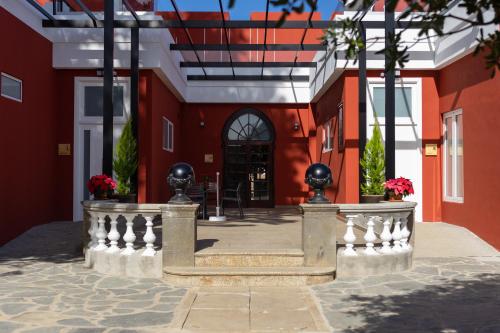 a building with a staircase in front of a building at Albor Suites in Santa Brígida