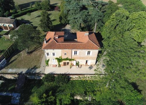 an overhead view of a large house with a roof at CHATEAU DU GO in Albi