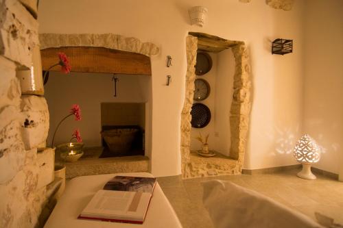 Vuode tai vuoteita majoituspaikassa Manidibianco Apulian Relaxing Stay