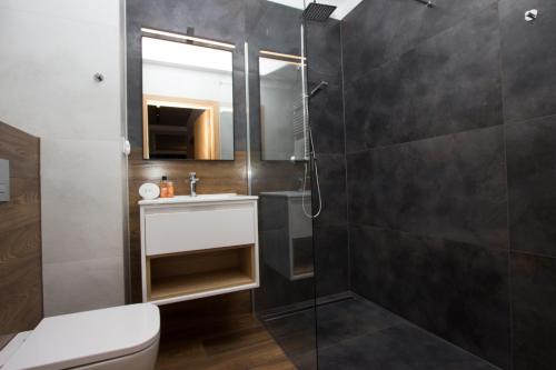Koupelna v ubytování Lenzo Apartments Wieliczka