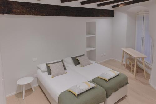 Cama o camas de una habitación en Duomo Apartment