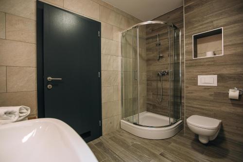 A bathroom at Apartma EVA Golte