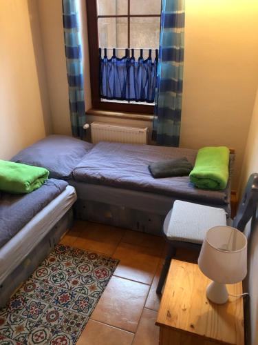 Ένα ή περισσότερα κρεβάτια σε δωμάτιο στο Apartmány Diana