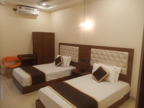 Cama o camas de una habitación en Paras Mahal