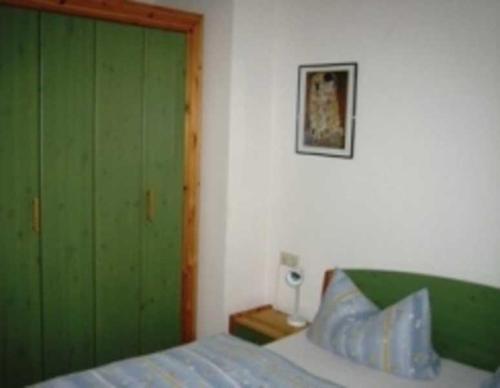 Postel nebo postele na pokoji v ubytování Haus am Roessleweiher