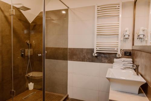 Ένα μπάνιο στο Boutique Hotel Cattaleya