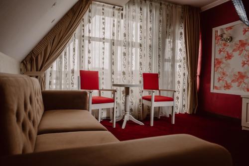 Χώρος καθιστικού στο Boutique Hotel Cattaleya