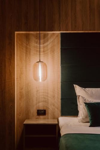 Ένα ή περισσότερα κρεβάτια σε δωμάτιο στο Boutique Hotel Cattaleya