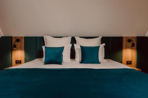 Ένα ή περισσότερα κρεβάτια σε δωμάτιο στο Boutique Hotel Cattaleya