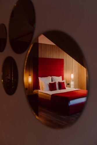 Ένα ή περισσότερα κρεβάτια σε δωμάτιο στο Boutique Hotel Cattaleya