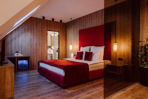 Ένα ή περισσότερα κρεβάτια σε δωμάτιο στο Boutique Hotel Cattaleya