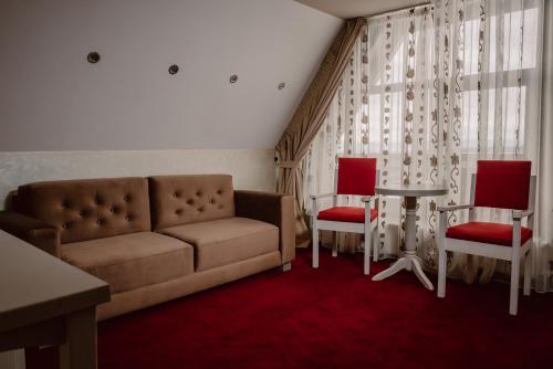 Χώρος καθιστικού στο Boutique Hotel Cattaleya