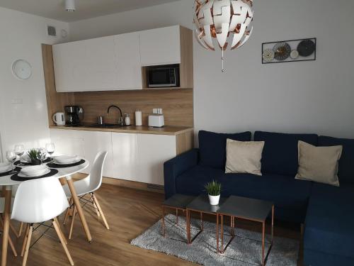 Kuchyň nebo kuchyňský kout v ubytování Apartament Piaskowy Sunset Resort