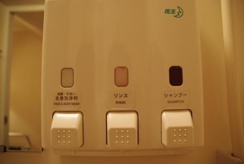 a close up of a microwave oven at Country Hotel Takayama in Takayama