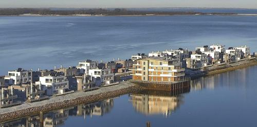 an aerial view of a city next to the water at Schleivilla Hafenmeister in Kappeln