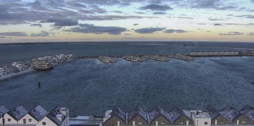 an aerial view of a harbor with boats in the water at Schleivilla Hafenmeister in Kappeln