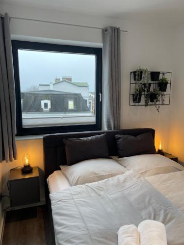 Ένα ή περισσότερα κρεβάτια σε δωμάτιο στο Penthouse am Park