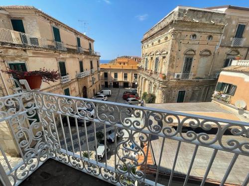 a view of a city from a balcony at B&B Costa degli Dei in Tropea