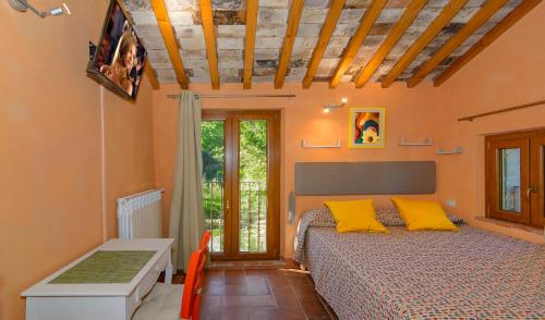 เตียงในห้องที่ Dolce Vita in Tuscany B&B