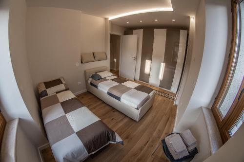 an overhead view of a bedroom with two beds at Palazzo del Principe in Castel di Sangro