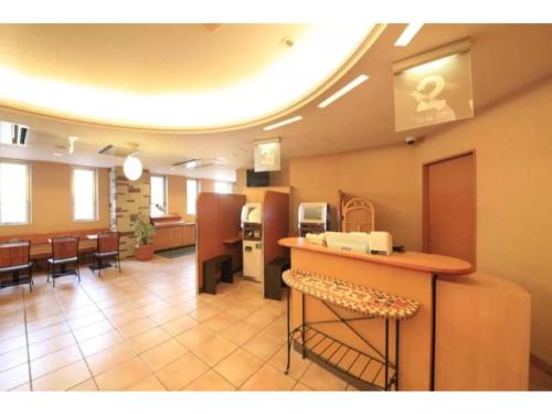 a waiting room with a bar in a hospital at R&B Hotel Kumagaya Ekimae - Vacation STAY 40475v in Kumagaya