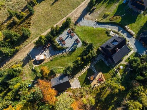 an aerial view of a house with a yard at Domek w Górach- Bacówka u Dudka in Nowy Targ