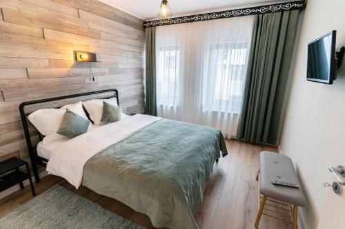 Ένα ή περισσότερα κρεβάτια σε δωμάτιο στο MyApartment
