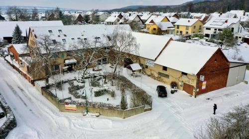 an aerial view of a town in the snow at Lechstedter Obstweinschänke in Bad Salzdetfurth