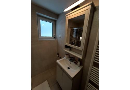 Ένα μπάνιο στο Apartments Mici