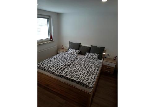 Ένα ή περισσότερα κρεβάτια σε δωμάτιο στο Apartments Mici