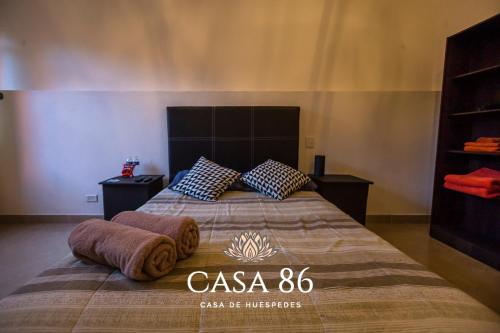 Postel nebo postele na pokoji v ubytování Casa 86