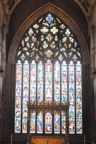 a large stained glass window in a church at String Of Horses in Carlisle